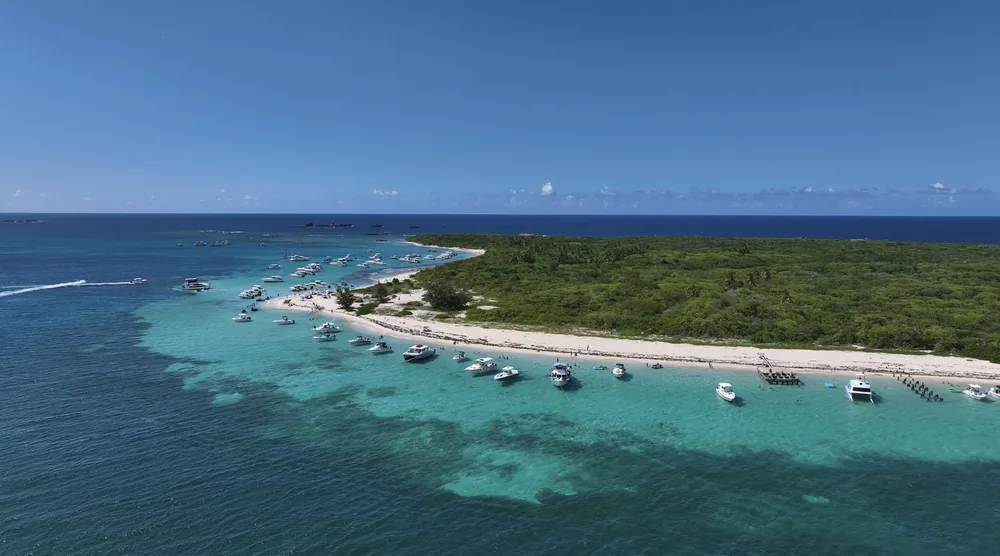 Aerial drone photo of a cay and coastline in Puerto Rico, shot by Zoom Realty Services